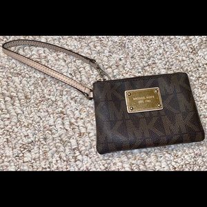 Brown Michael Kors wristlet/coin purse